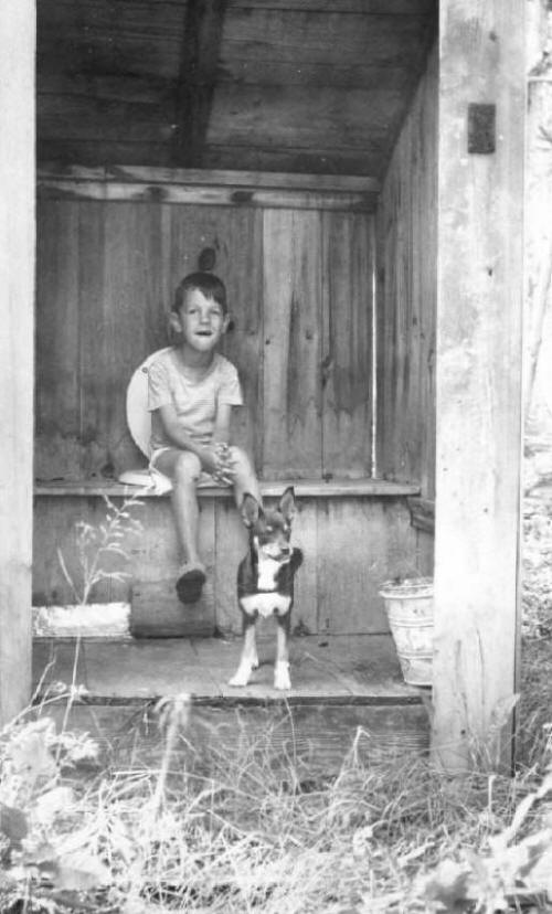 Steve and Boots in Outhouse