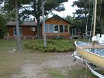 Front Of Cabin With Sailboat, 63 kb